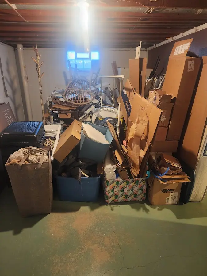 Roll-off dumpster container at job site for 2 Yard Dumpster Rental in Sioux City